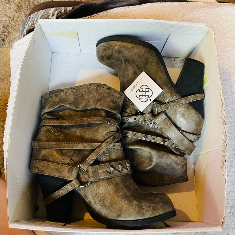 Daisy Fuentes brown boots with detailed straps across the front and heel
